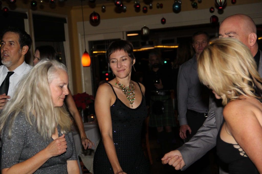 Jesse Rutherford celebrating the holiday with NOVO team members at a restaurant
