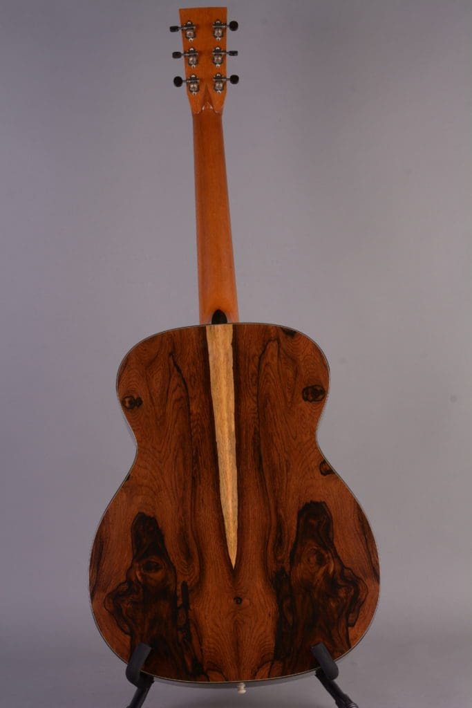 D71_9465 acoustic guitar with intricate mirrored wood grain pattern