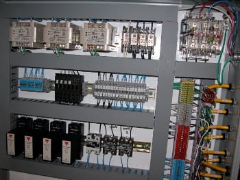 Modular electronic controls for microplate cleaning system