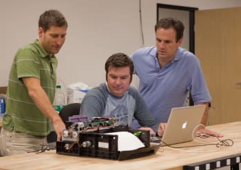 NOVO engineers working on a page-wide array graphics printer