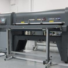 Development engineer testing grand format UV printer